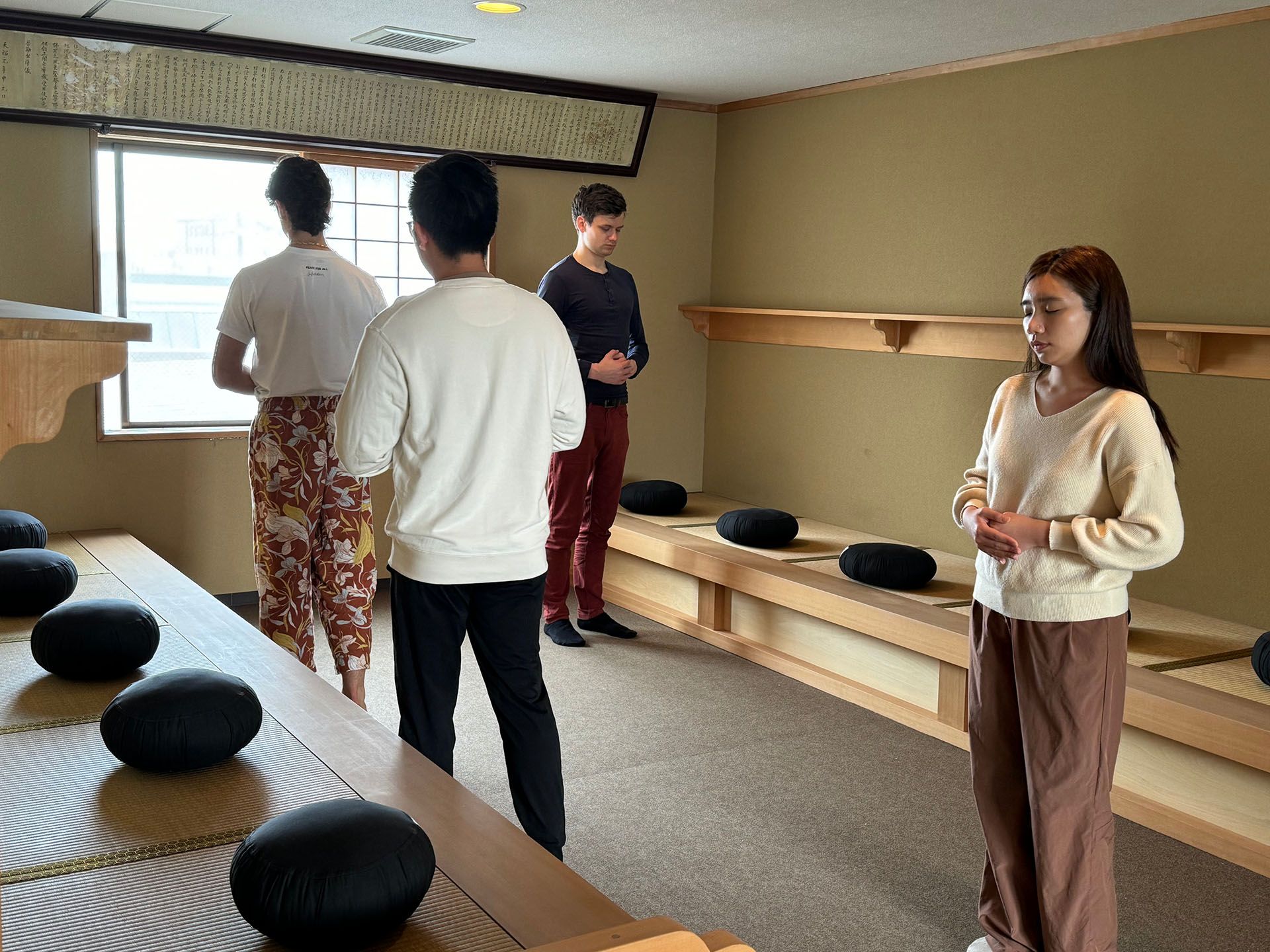 Language students practicing zen meditation