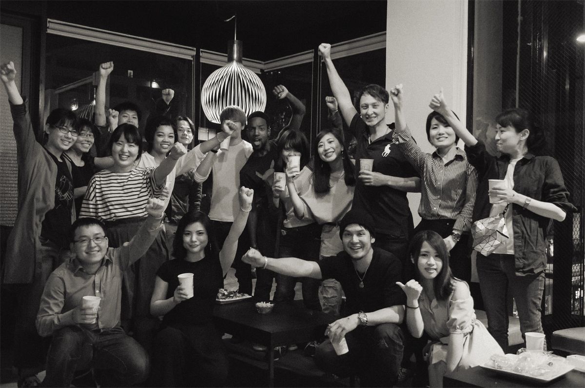 Language students and language teachers celebrating at after-school event
