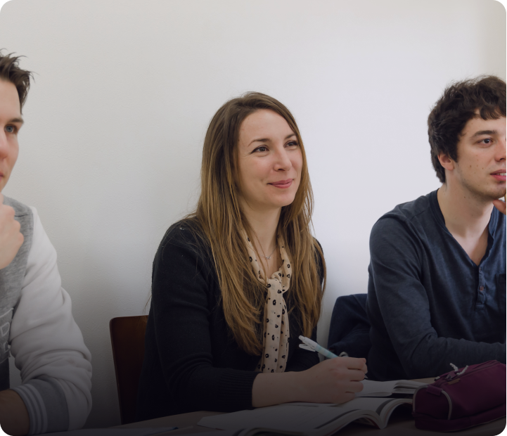 Language students enjoying listening in class